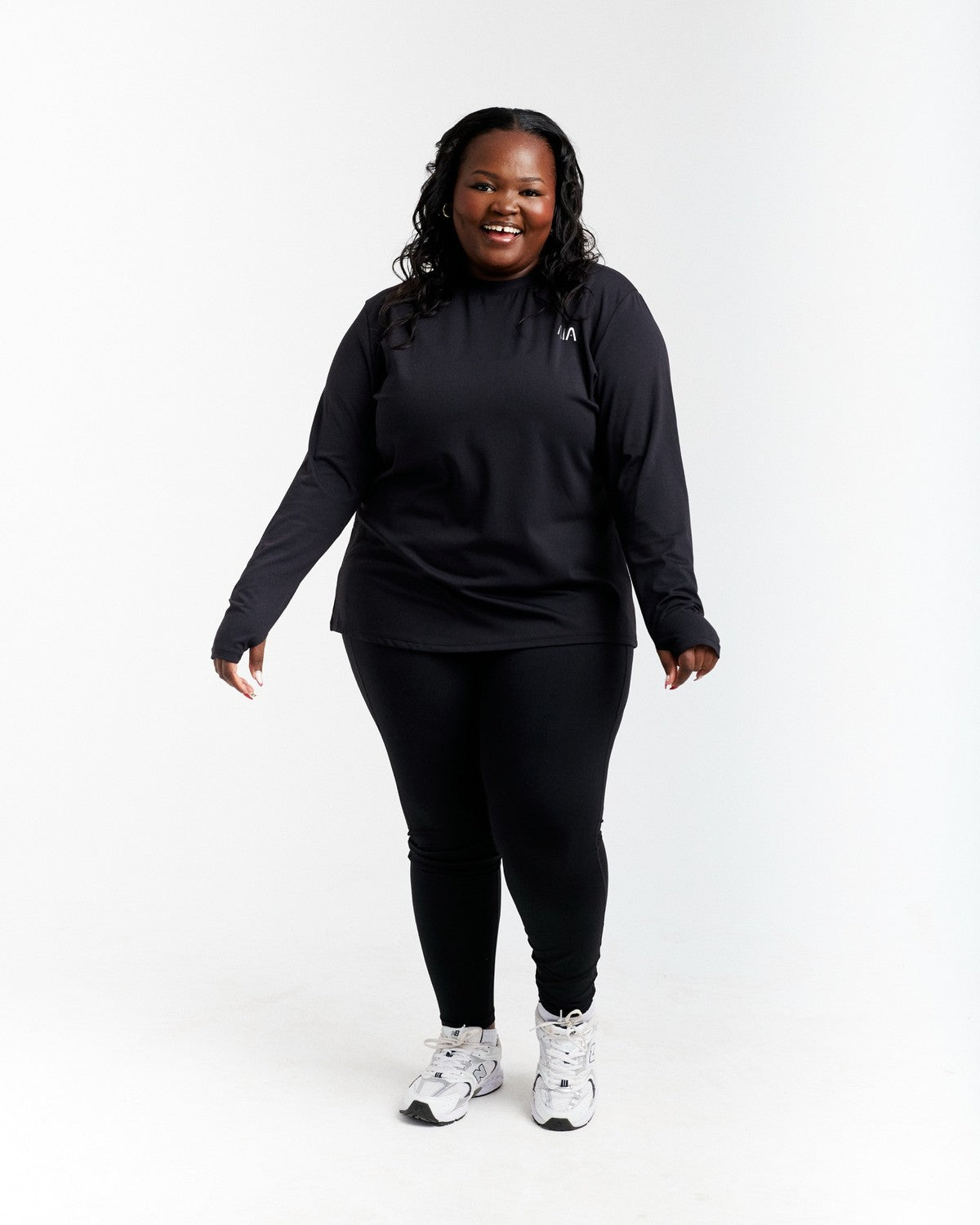 AIA Stride Leggings — Black