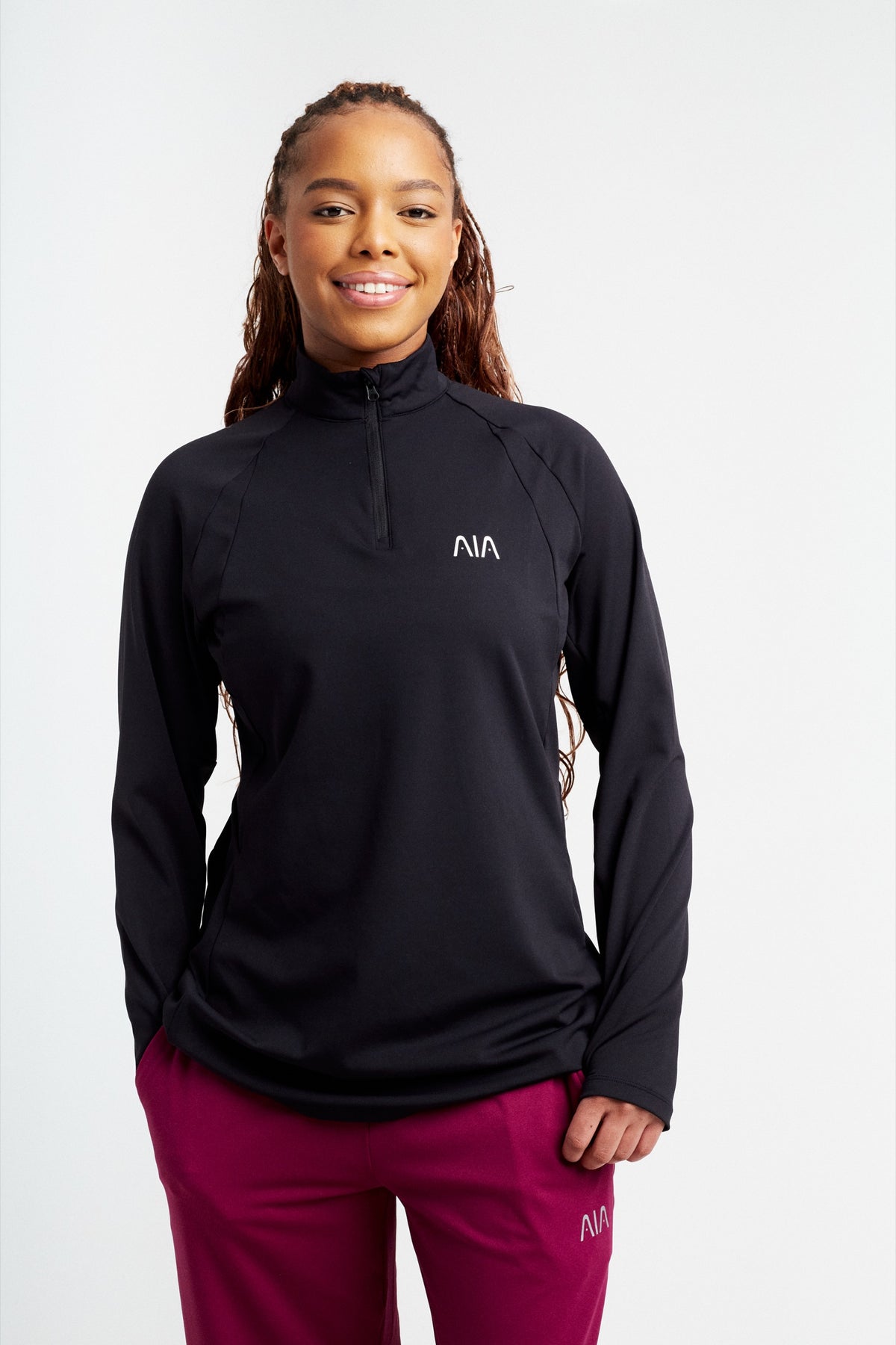 AIA Pulse Zip Top — Black