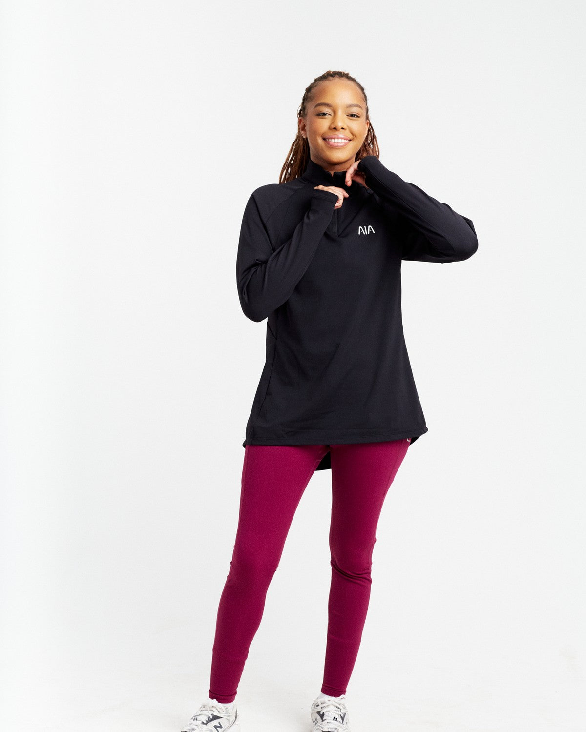 AIA Pulse Zip Top — Black